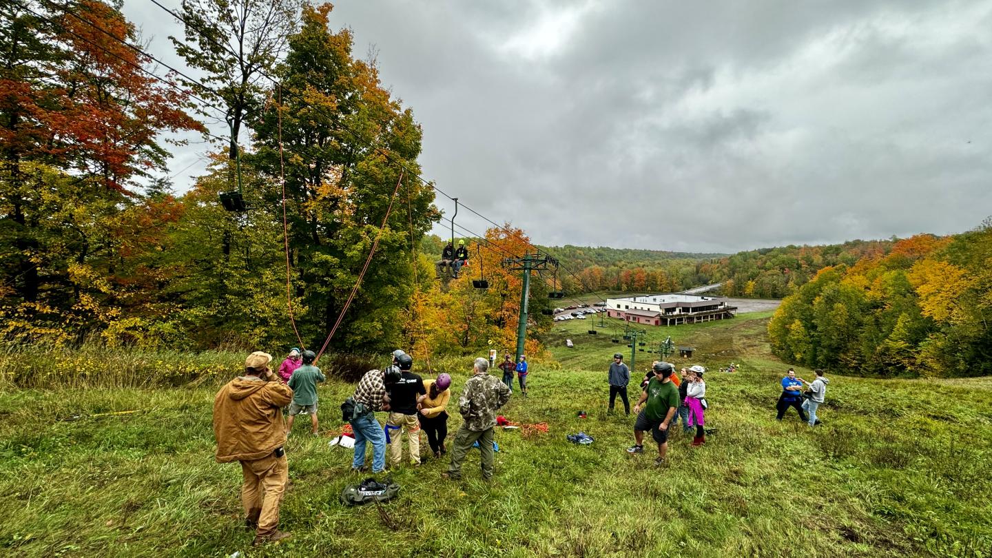Ski Patrollers practicing evacuating a chairlift at Black River Basin